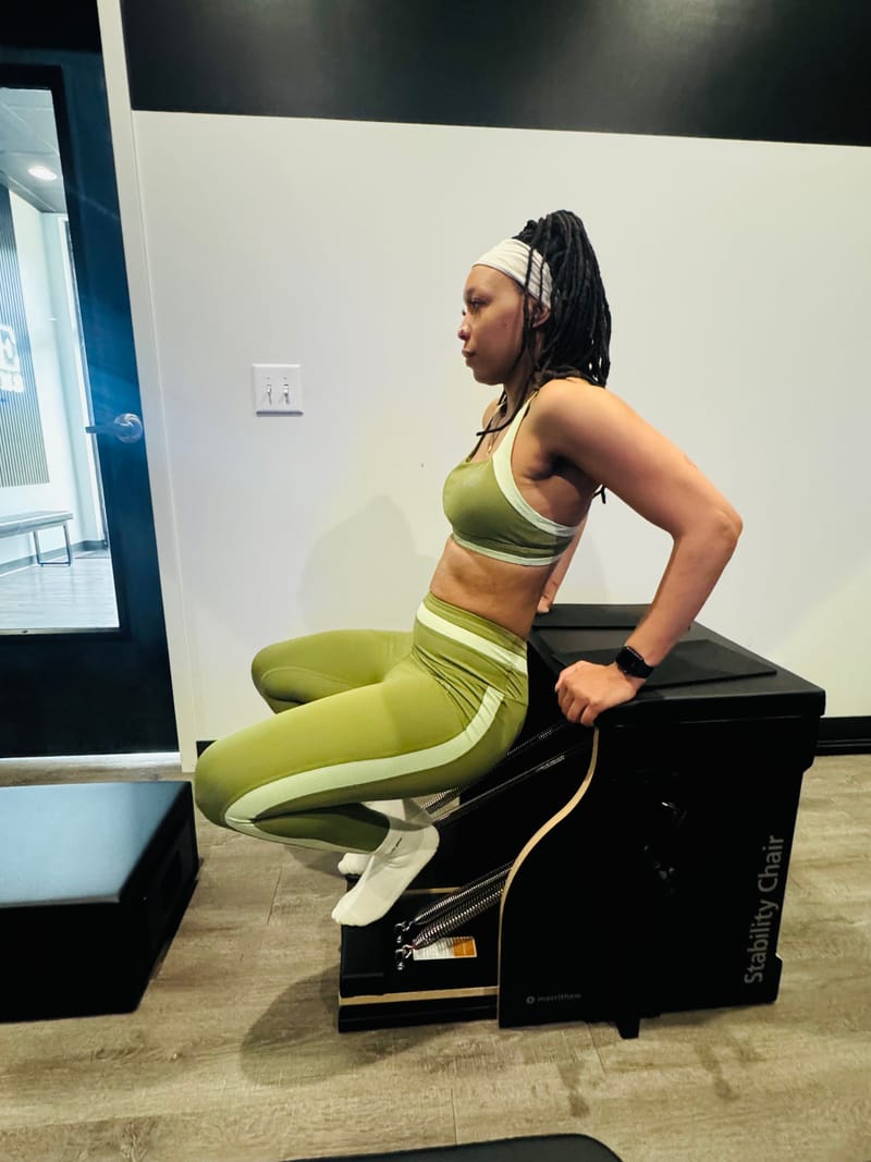 Seated dip on the Stability Chair during private training at Core Ambitions