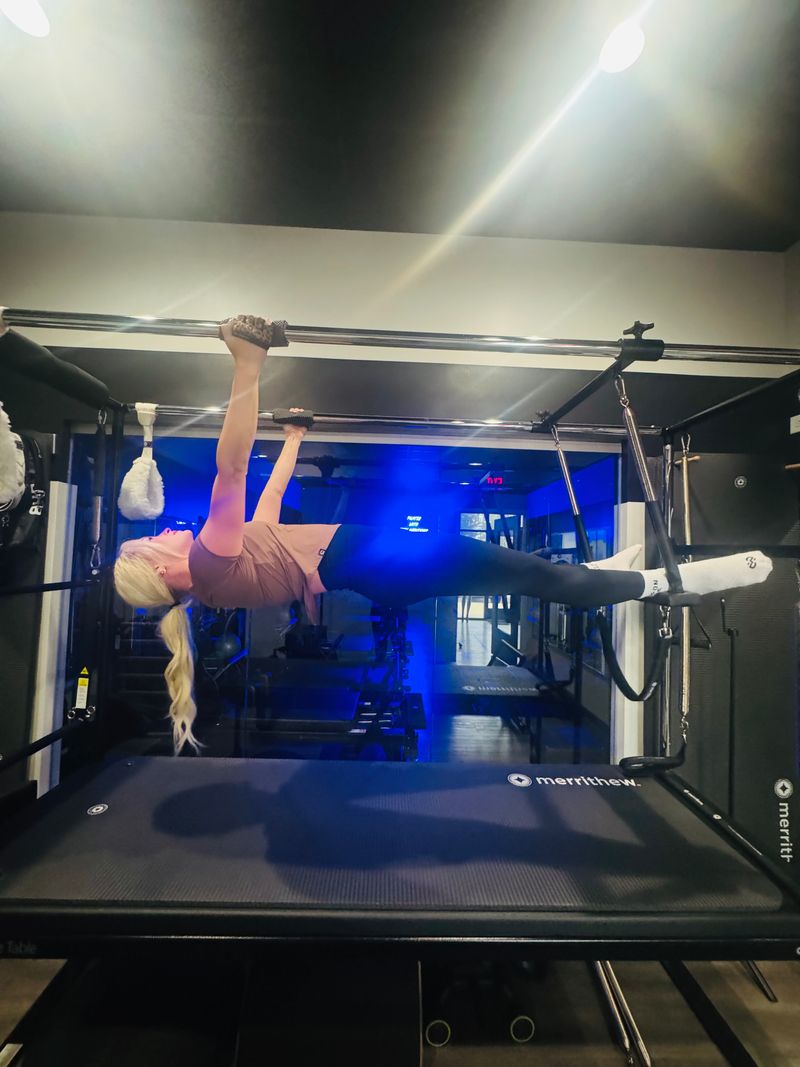 Tower Cadillac inverted exercise during private training at Core Ambitions